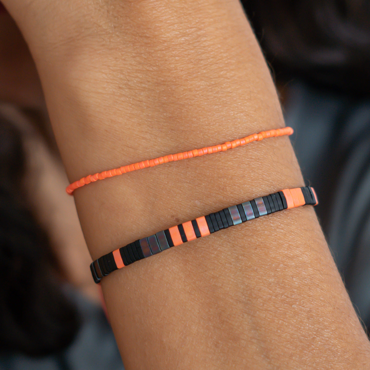 damen perlenarmbänder orange schwarz