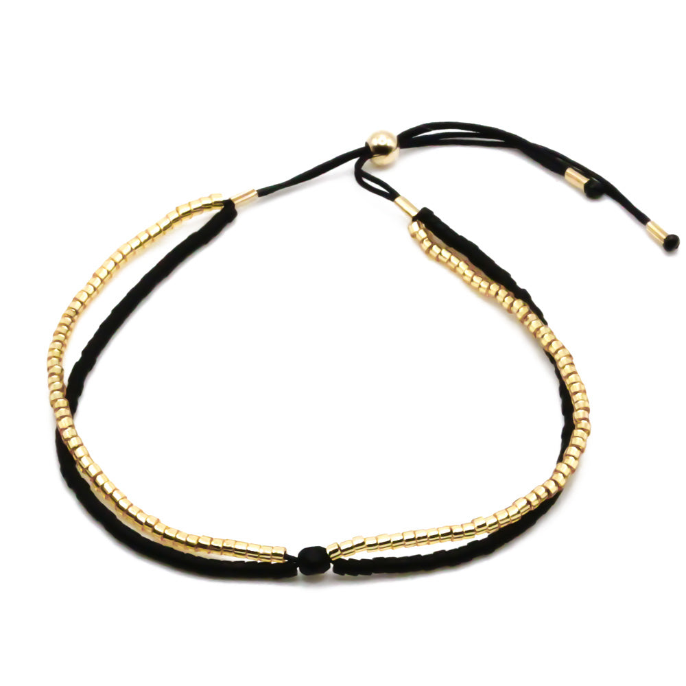 perlenarmband schwarz gold