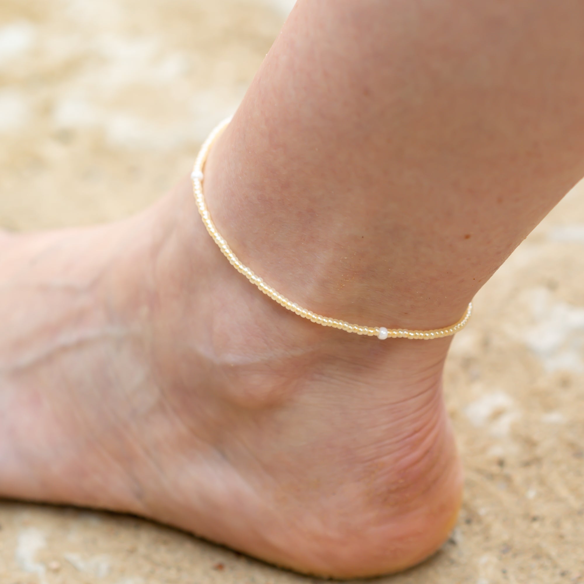 perlen fußkette gelb