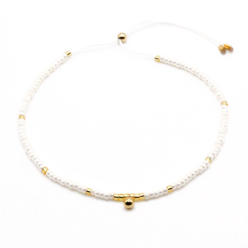 Perlenarmband Gold mit Anhänger