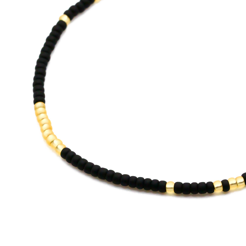 perlenarmband schwarz gold