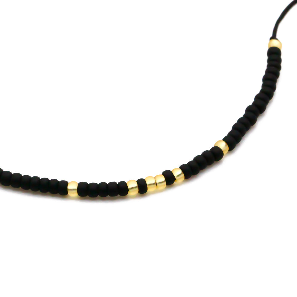 perlenarmband schwarz gold