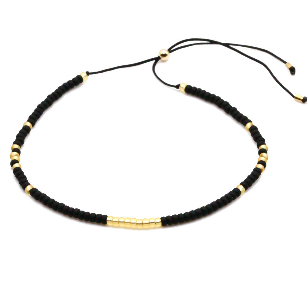 perlenarmband schwarz gold
