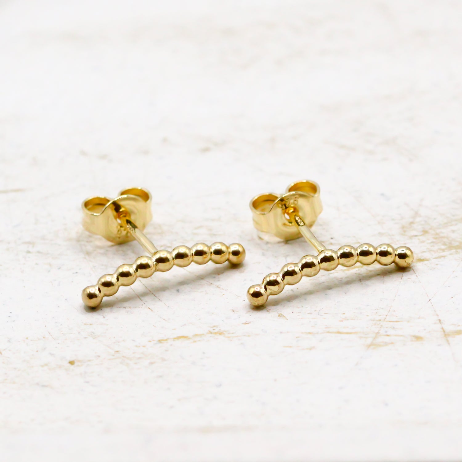 Ohrrstecker Bogen Gold