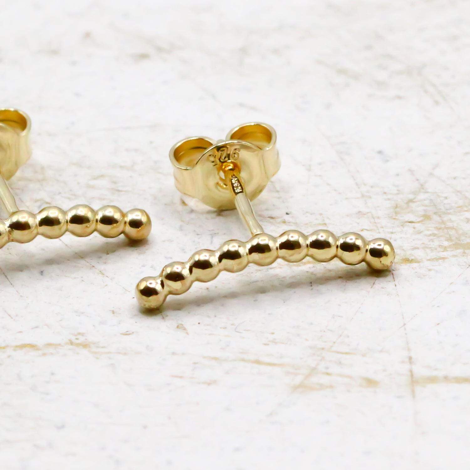 Bogen Ohrstecker Gold