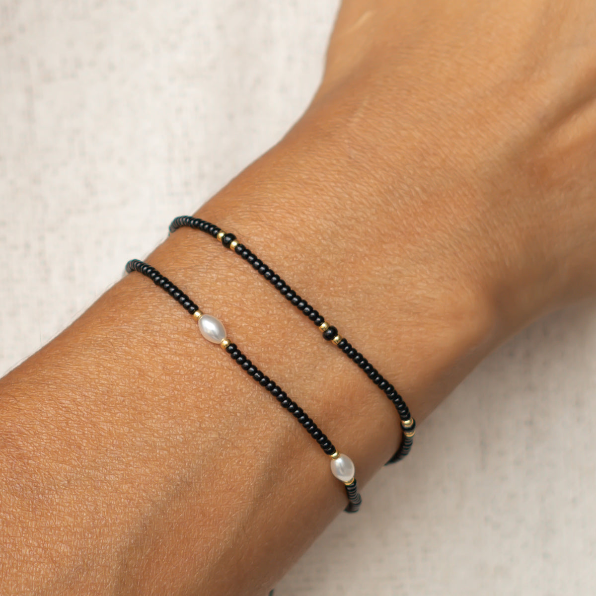 damen perlenarmbänder set in schwarz mit gold