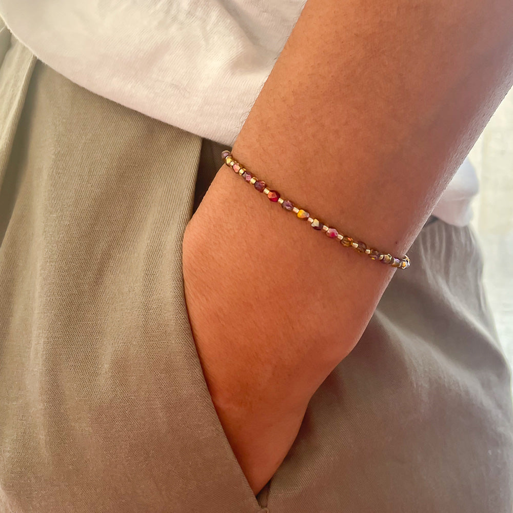 Perlenarmband golden mit Kristallen