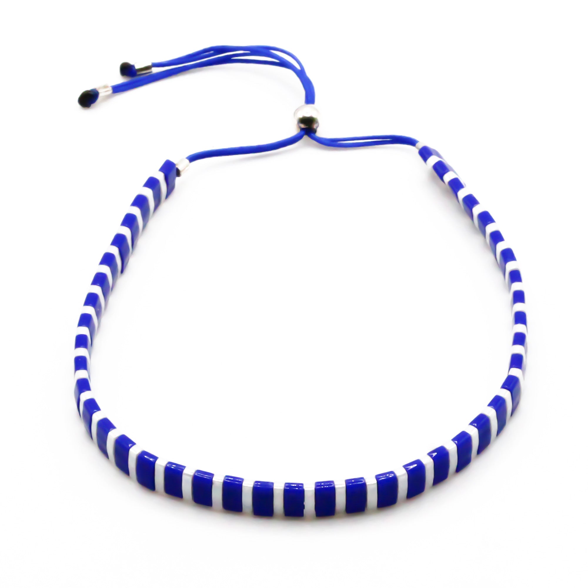 Perlenarmband gestreift in blau und creme weiss