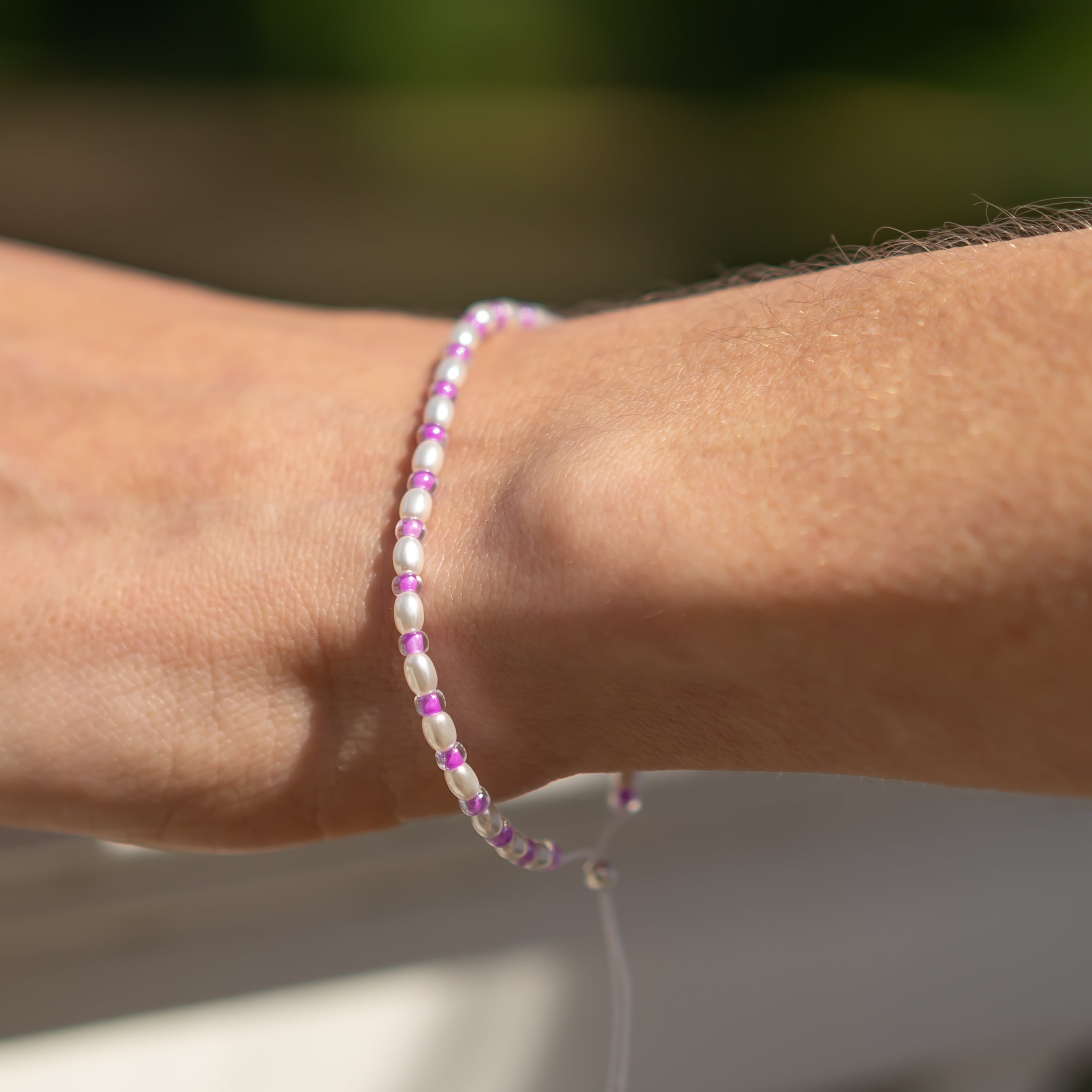 Perlenarmband lila perlen
