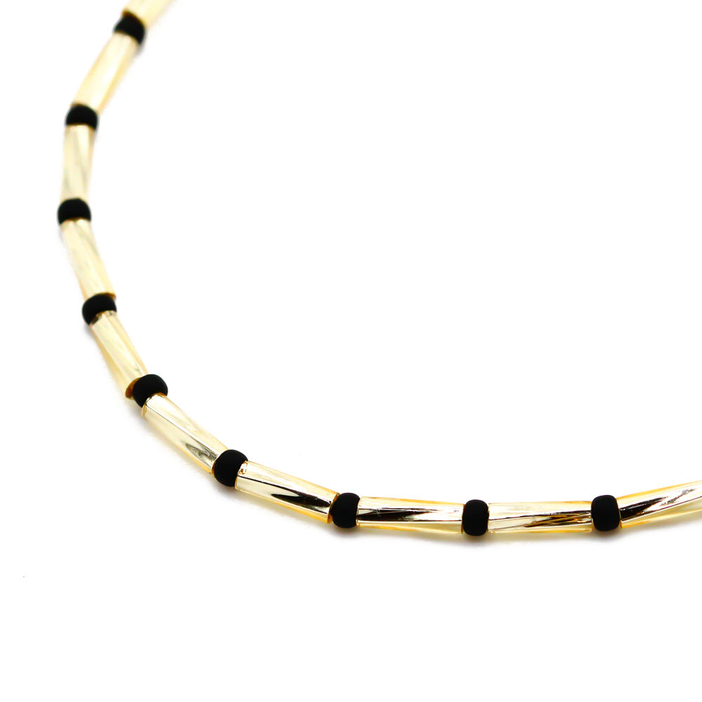 Perlenarmband schwarz gold