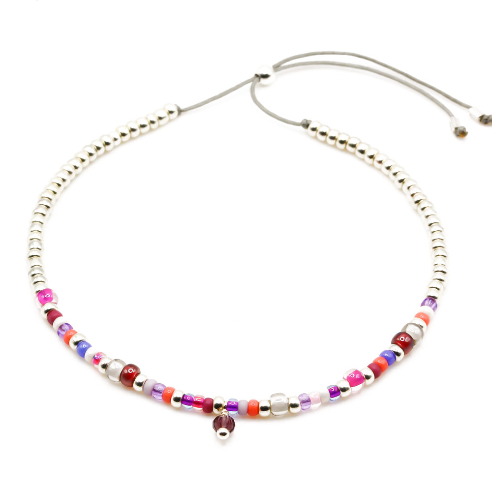 Handgemachtes Damen Perlenarmband mit rosa, lila und roten Perlen, silberne Akzente, verstellbar. - Boho Perlenarmbänder Set Pink Wildflower - Lila, Pink