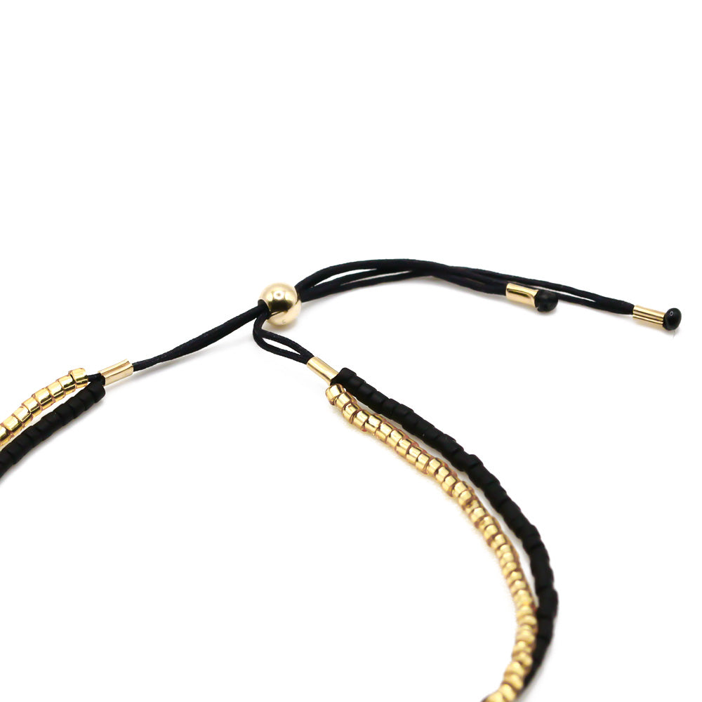 perlenarmband schwarz gold