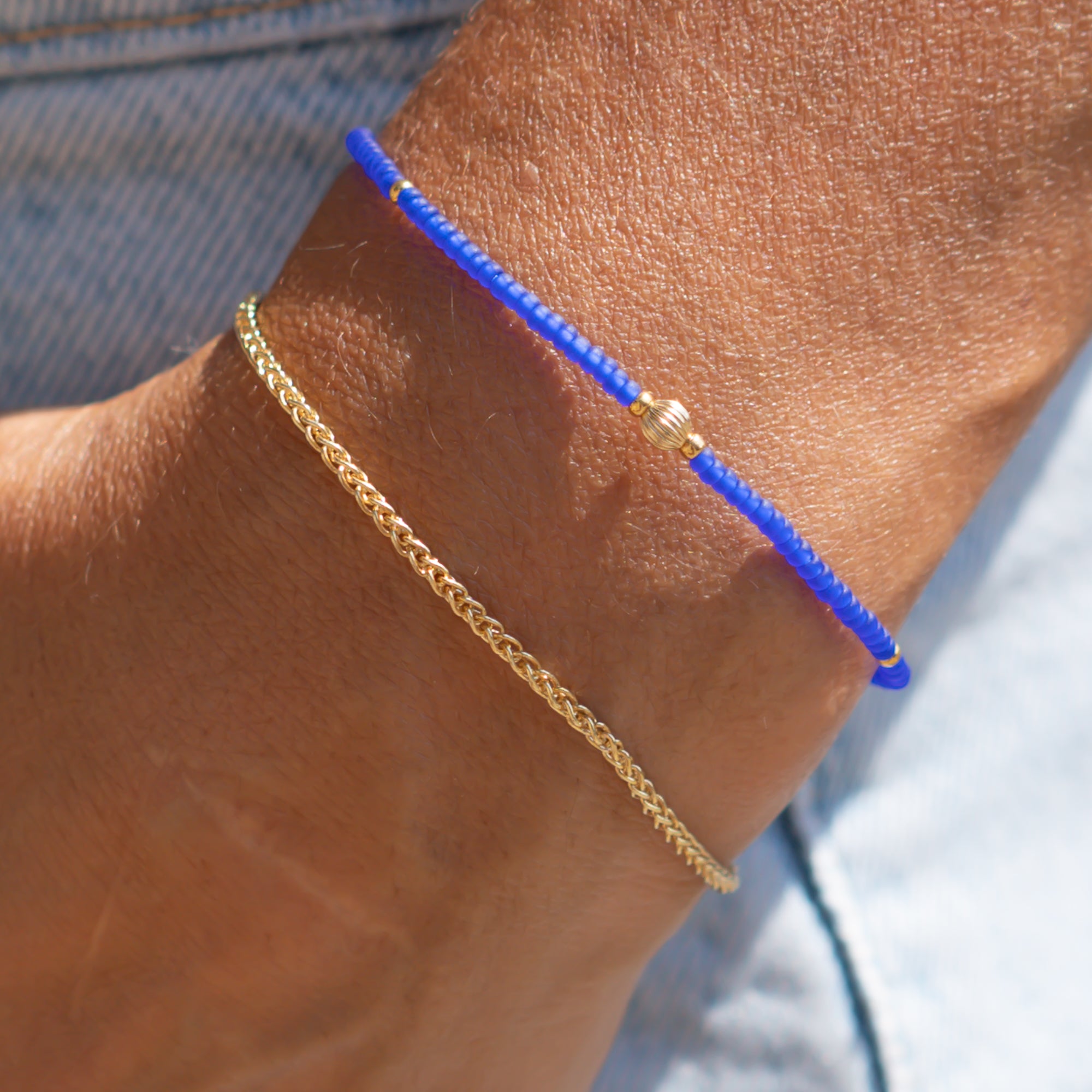 damen perlenarmbänder gold und blau
