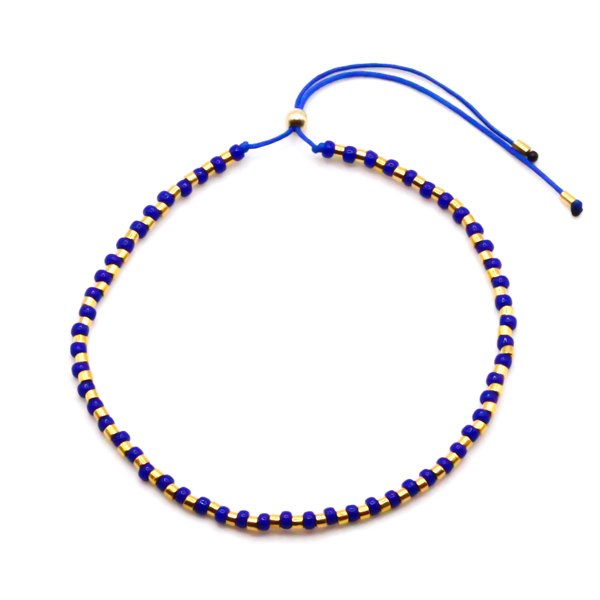 feines, zartes damen perlenarmband in blau gold