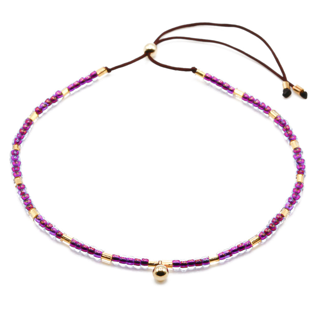 Perlenarmband lila